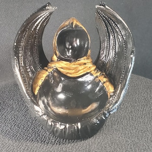 Winged Hooded Figure Sphere Holder