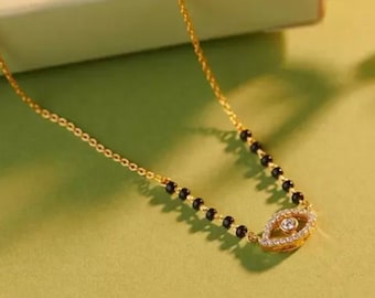 AD designs Diamond Mangalsutra/black beads gold chain necklace/gorgeous small evil eye bead design pendant /AD Traditional Mangalsutra.