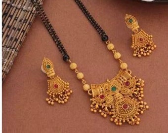 Elegant Traditional Handmade South Indian mangalsutra Style Gold vati designs Mangalsutra Necklace with Black Beads .