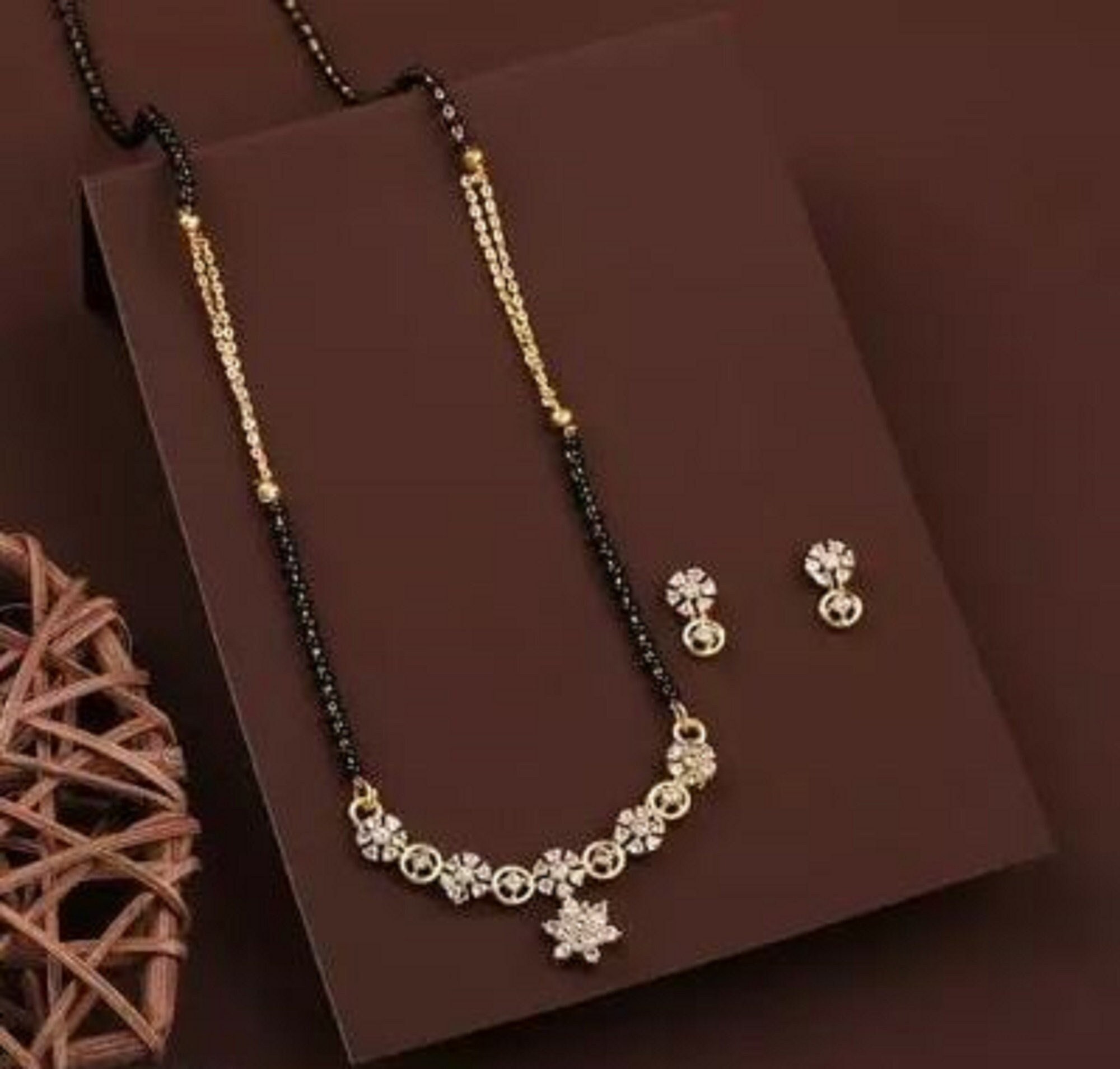 White pearl mangalsutra deals