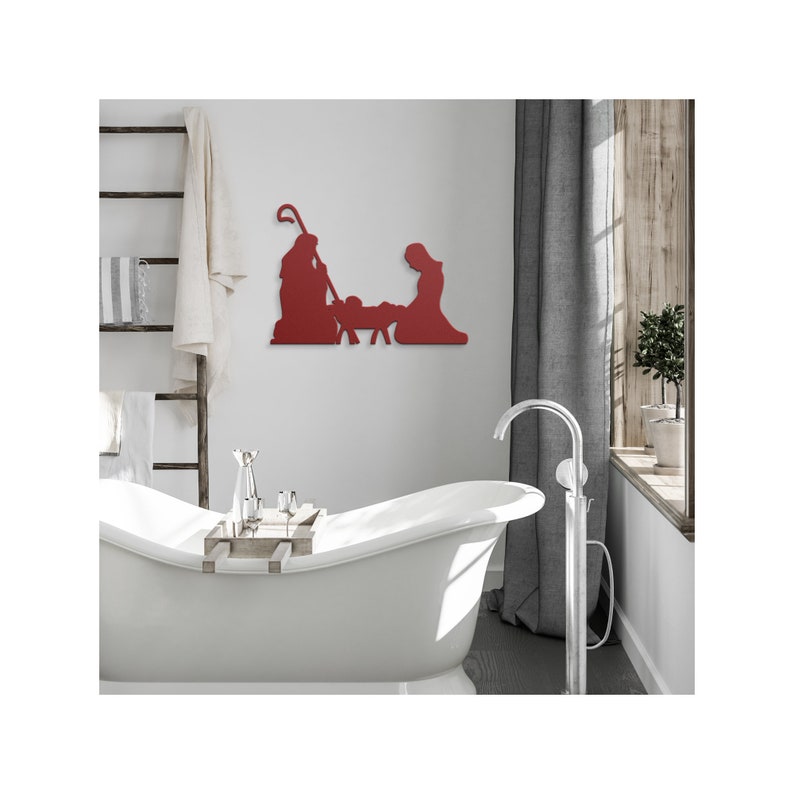 May include: Red metal silhouette wall art depicting the nativity scene with Mary, Joseph, and baby Jesus in a manger.