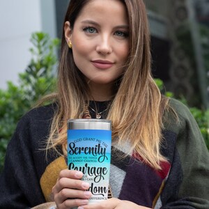 May include: A stainless steel tumbler with a blue and white ombre design. The tumbler features the text "God Grant Me The Serenity To Accept The Things I Cannot Change: Courage To Change The Things I Can And Wisdom To Know The Difference."