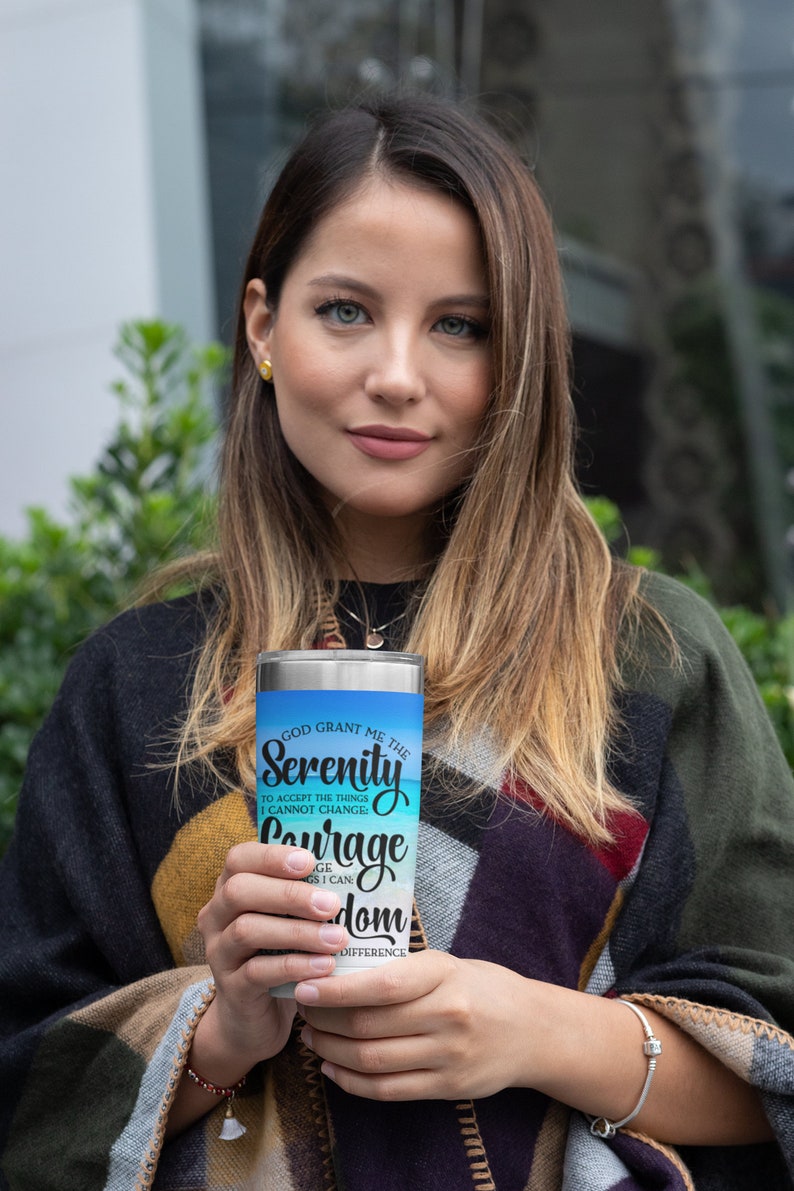 May include: A stainless steel tumbler with a blue and white ombre design. The tumbler features the text "God Grant Me The Serenity To Accept The Things I Cannot Change: Courage To Change The Things I Can And Wisdom To Know The Difference."