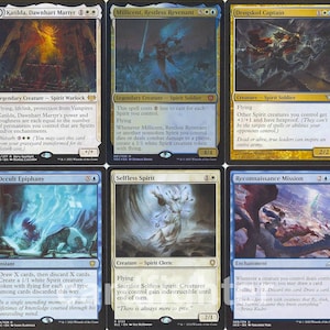May include: A collection of Magic: The Gathering trading cards. The cards feature various fantasy creatures and spells, with vibrant artwork and text descriptions. The cards are in English and are designed for gameplay.