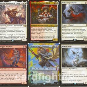 May include: A collection of Magic: The Gathering trading cards. The cards feature various fantasy creatures and characters, with vibrant artwork and text descriptions. The cards are in English.
