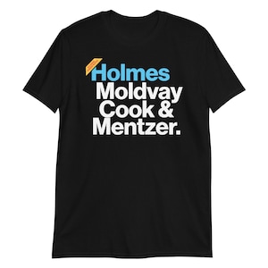 May include: Black t-shirt with white text that reads "Holmes Moldvay Cook & Mentzer."