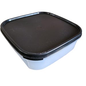 May include: A square, clear plastic container with a black lid. The lid has a slightly textured surface and fits snugly over the container. The container is designed for food storage and is suitable for various uses.