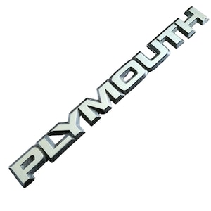 Plymouth OEM 1984-1990 S Body 9 3/8&quot; Emblem Badge Logo Name Plate Name 4328117