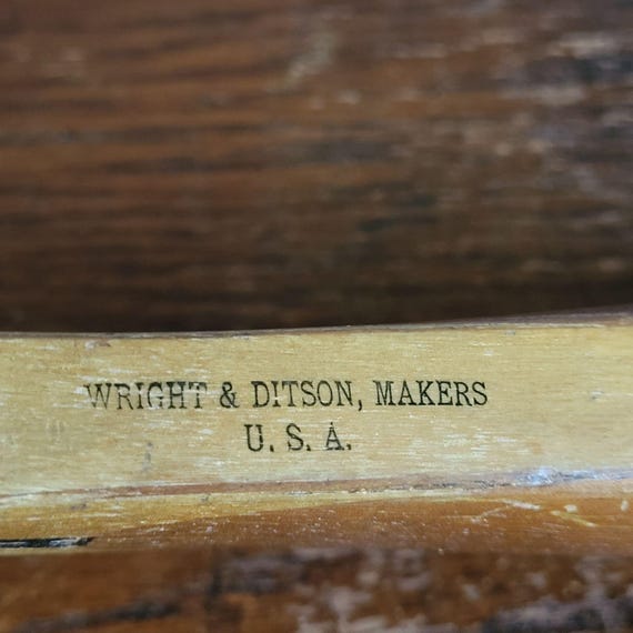 Ancienne paire de raquettes de tennis en bois début des années 1900