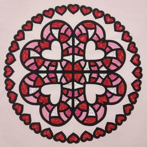 May include: A pink and red heart-shaped mandala with a black outline. The mandala is surrounded by a circle of black hearts.