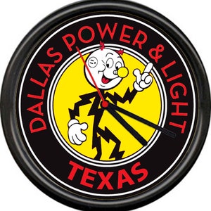 May include: A black and yellow clock with a cartoon character of a stick figure with lightning bolts for legs. The character is wearing a white hat with a red lightning bolt and has a red nose. The clock face says "Dallas Power & Light Texas".