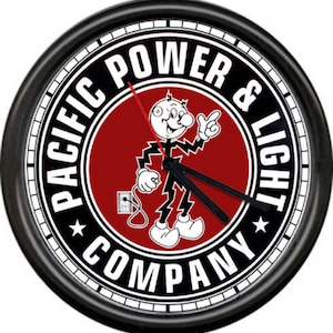 May include: Black and white clock with a red circle in the center. The circle features a cartoon character with a lightning bolt and the text "Pacific Power & Light Company".