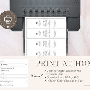 May include: A printer with a sheet of paper in it, showing a printable design for a sticker. The text on the screen says "PRINT AT HOME" and includes instructions for printing and downloading the design.