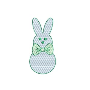 May include: A blue bunny with green eyes and a green bow tie. The bunny is embroidered with a textured pattern.