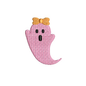 Puede incluir: Fantasma rosa con un lazo amarillo, diseño bordado.