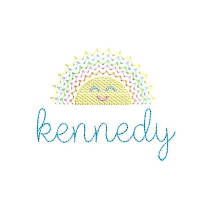 May include: A colorful rainbow sun with a smiling face and the name "kennedy" written in blue cursive.