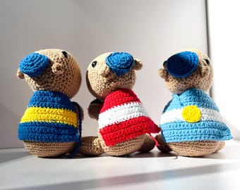 Handgemaakte gehaakte capibara-amigurumi met Argentijnse vlag
