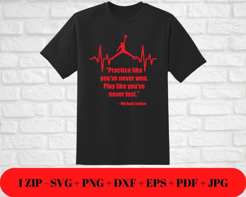 Peut inclure: T-shirt noir avec une silhouette rouge d'un joueur de basket-ball en train de dunker, un graphique de battement de c&oelig;ur rouge et la citation "Pratiquez comme si vous n'aviez jamais gagn&eacute;. Jouez comme si vous n'aviez jamais perdu." attribu&eacute;e &agrave; Michael Jordan.