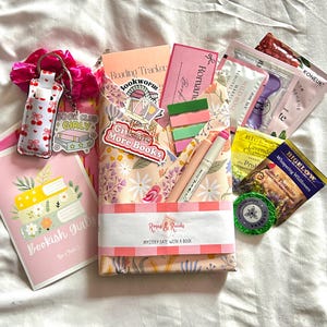 May include: A set of three ceramic mugs with a speckled, matte finish. The mugs are in shades of cream, light gray, and dark gray. Each mug has a simple, minimalist design, perfect for coffee or tea.