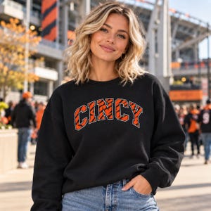 Bengals Cincy tiger stripe sweatshirt | CINCY collegiate arched text