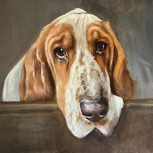 May include: A close-up oil painting of a Basset Hound dog with a sad expression. The dog has brown and white fur, with long, floppy ears and a wrinkled face. The dog is looking down, with a dark brown background.