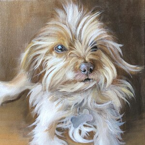 May include: A detailed painting of a small dog with long, light brown and white fur. The dog has a bone-shaped tag around its neck. The background is a solid, warm brown color.