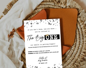 May include: A black and white birthday party invitation with the text "The Big ONE" and a gold crown. The invitation includes details about the party, including the date, time, and location. The text "Holla at my mama by March 1st" is also included.
