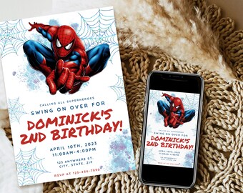 May include: A red and blue Spiderman character is featured on a birthday invitation. The invitation is for Dominick's 2nd birthday party. The invitation has a blue and white web design and the text "Calling all superheroes, swing on over for Dominick's 2nd birthday!"  The date and time of the party are listed as April 10th, 2023 from 11:00 AM to 4:00 PM. The address is 123 Anywhere St., City, State, Zip. The RSVP number is 123-456-7890.