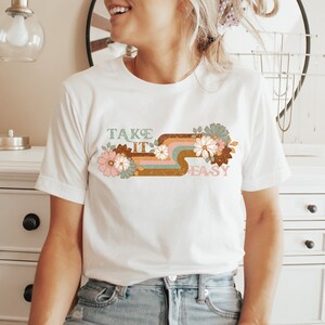Retro Flower Sublimation Design for T-Shirts, Digital PNG Take It Easy Design, 80s Vintage Floral PNG. Retro Sublimation Designs for T-shirts. Distressed retro Sublimation designs for tumblers and tees.