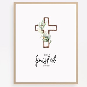 May include: A printable art print with a watercolor illustration of a wooden cross with green leaves. The text "It is finished" and "John 19:30" is below the cross.