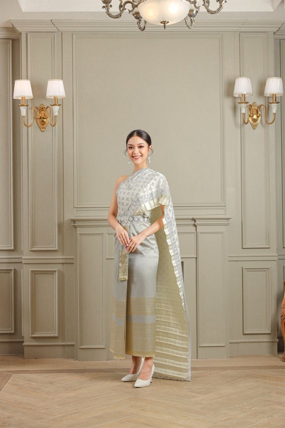 modern thai silk dress Embrace elegance with our exquisite turquoise Thai silk dress adorned with delicate French lace appliqu . Perfect for those who value timeless beauty and exceptional craftsmanship. Limited pieces available don't miss