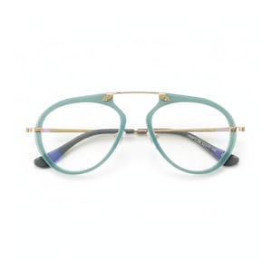 Könnte beinhalten: Brille im Aviator-Stil mit türkisfarbenem Rahmen und goldenen Akzenten. Die Gläser sind klar, und der Steg und die Bügel sind goldfarben. Der Text "LMD475 C4 53017-145" ist auf dem Bügel aufgedruckt.