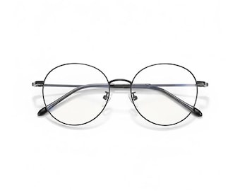 May include: A pair of round, black-framed eyeglasses. The lenses are clear, and the frame has a thin, minimalist design. The glasses are set against a plain white background, highlighting their sleek, modern aesthetic.