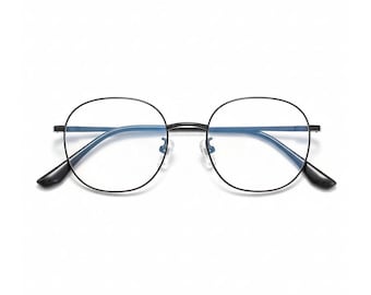 May include: A pair of round-framed eyeglasses with a black metal frame. The lenses are clear, and the nose pads are transparent. The temples are also black and curve slightly at the ends. The glasses are set against a white background.