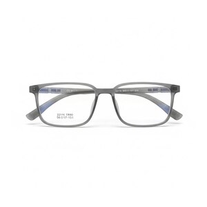 May include: Grey rectangular eyeglasses with clear lenses. The frames have a subtle, matte finish. The arms of the glasses have a blue accent near the hinges. The text "22116 TR90 56 17-151" is printed on the left arm.