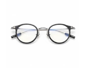 Montura redonda de titanio puro para gafas graduadas con protección contra la luz azul.