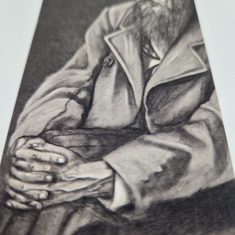 May include: A black and white pencil drawing of a man sitting with his hands clasped in his lap. He is wearing a coat and has a beard.