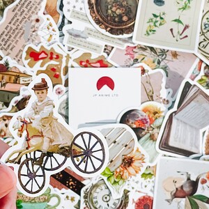 May include: A collection of vintage-style stickers featuring illustrations of children, flowers, clocks, and books. One sticker shows a child riding a toy horse on a tricycle. The stickers have a faded, antique aesthetic.