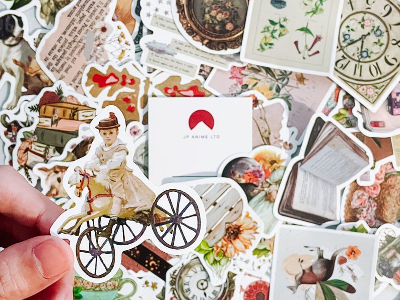 May include: A collection of vintage-style stickers featuring illustrations of children, flowers, clocks, and books. One sticker shows a child riding a toy horse on a tricycle. The stickers have a faded, antique aesthetic.