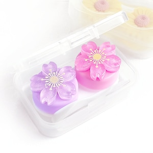 Lindo estuche de viaje para lentes de contacto de diseño, resistente al agua y con bonitas flores rosas y moradas brillantes