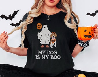 May include: Black t-shirt with a ghost and dog wearing a pumpkin hat. The text on the shirt reads "My Dog Is My Boo".