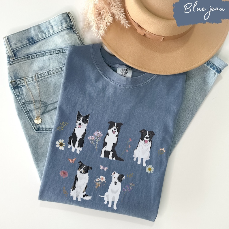May include: A blue jean t-shirt with a graphic of five border collies and flowers. The shirt has the text "Comfy Colors" on the tag.