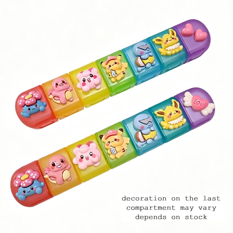 May include: Two colorful, segmented pill organizers with various cartoon character designs. Each segment is a different color, and the ends are purple. The text at the bottom says, "decoration on the last compartment may vary depends on stock."
