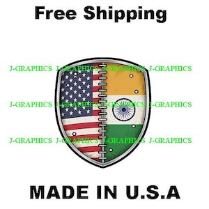 May include: A shield-shaped graphic featuring the American and Indian flags, stitched together. The text "MADE IN U.S.A" is displayed below the shield, with "Free Shipping" above. The graphic includes the text "J-GRAPHICS".