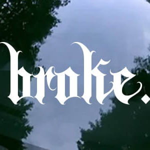 May include: White vinyl decal with the word "broke" written in a gothic font style.