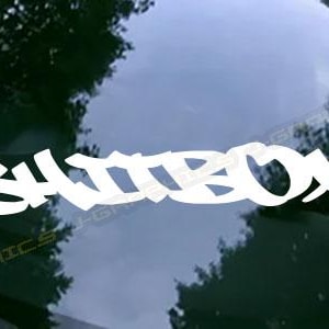 May include: White vinyl decal with the word "SHITBOX" written in a graffiti style font.