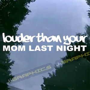 May include: White text on a blue background reads "louder than your MOM LAST NIGHT." The text is in a casual font. The background appears to be a window with trees and sky visible.