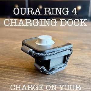 May include: A set of three ceramic mugs with a speckled, matte finish. The mugs are in shades of cream, light gray, and dark gray. Each mug has a simple, minimalist design and a rounded handle.