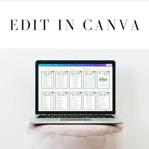 May include: A laptop computer displaying a Canva design for a game of "Campfire Bingo". The design features a green and white color scheme with a list of bingo squares.