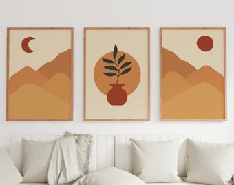 May include: Three framed prints with abstract designs in shades of brown, orange, and red. The prints feature a crescent moon, a plant in a pot, and a sun.
